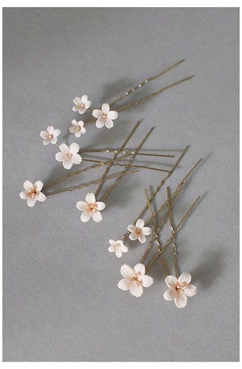 hermes small flower pins.